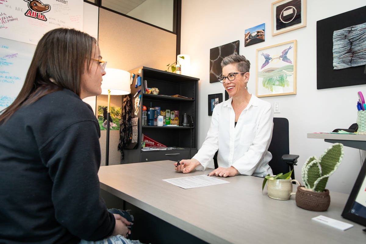 Career coach meets with a student to discuss career planning