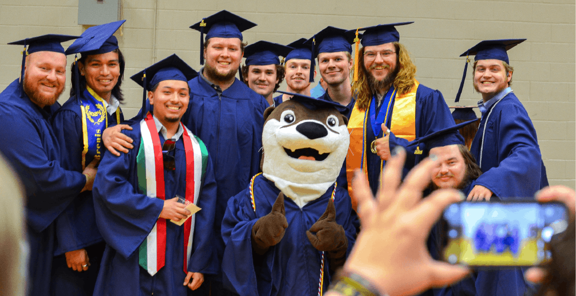 ACC graduation students posing for a picture