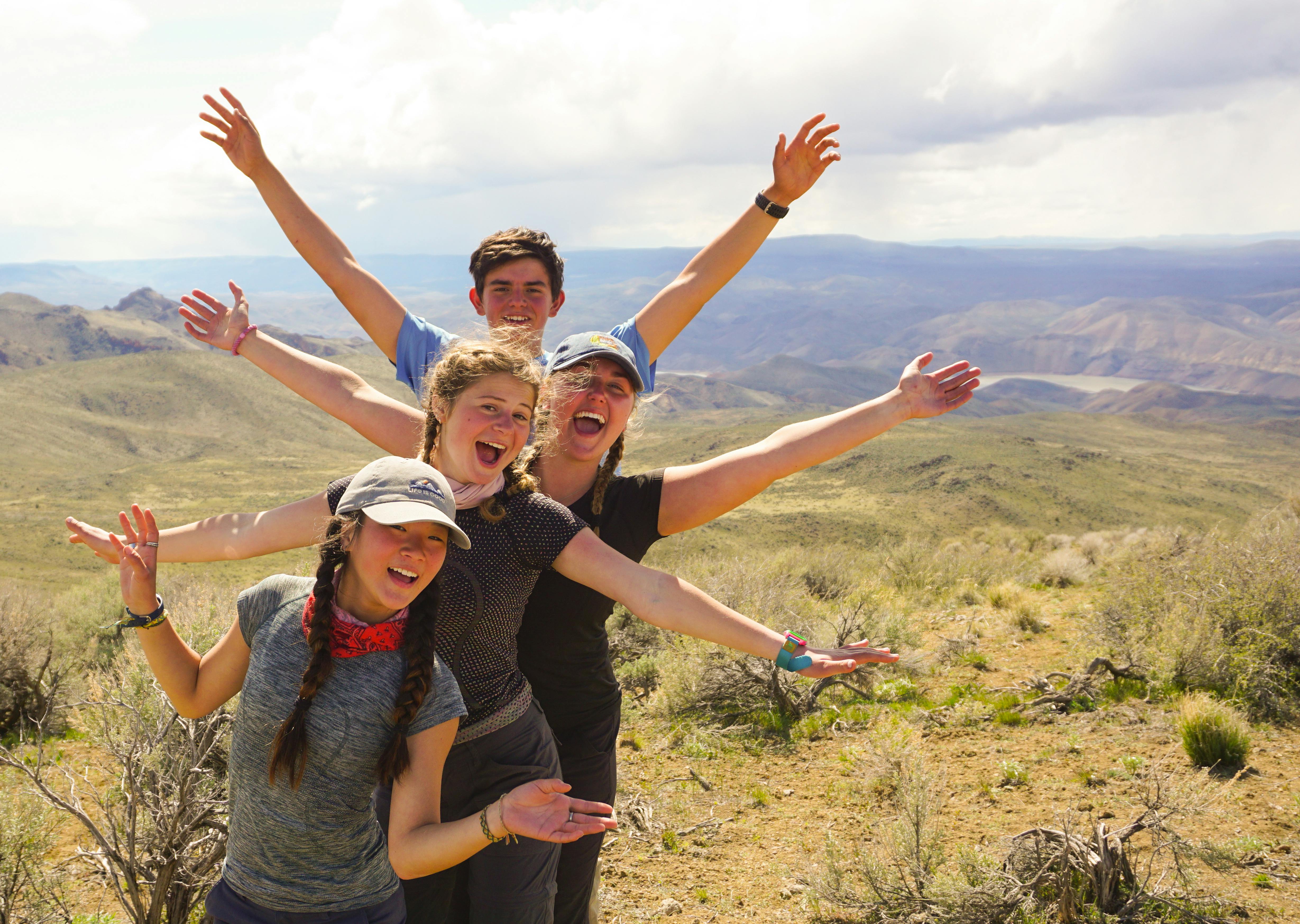 elm-pg-billboard-cta Students stretching out arms in excitement in Owyhee Canyonlands