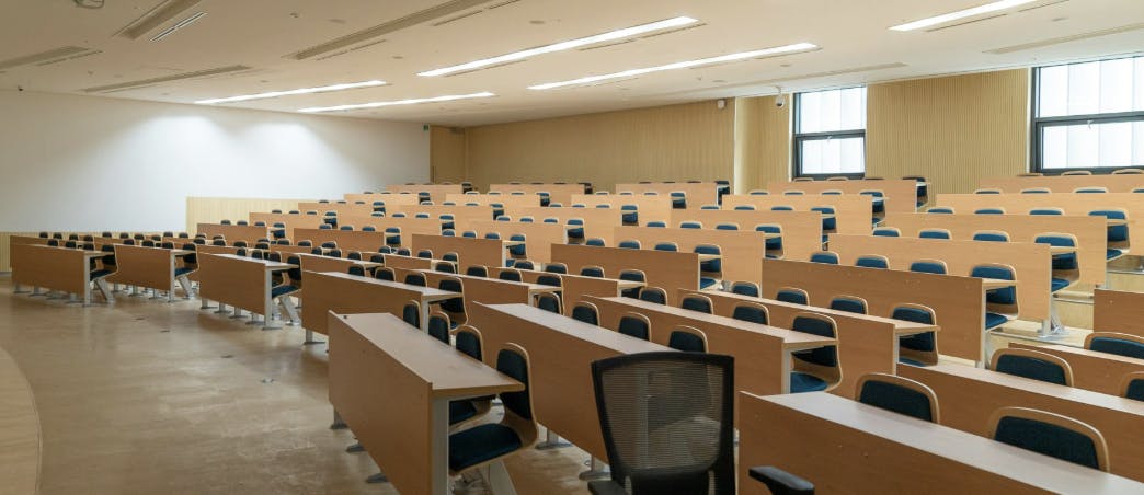 Empty college classroom with open seats