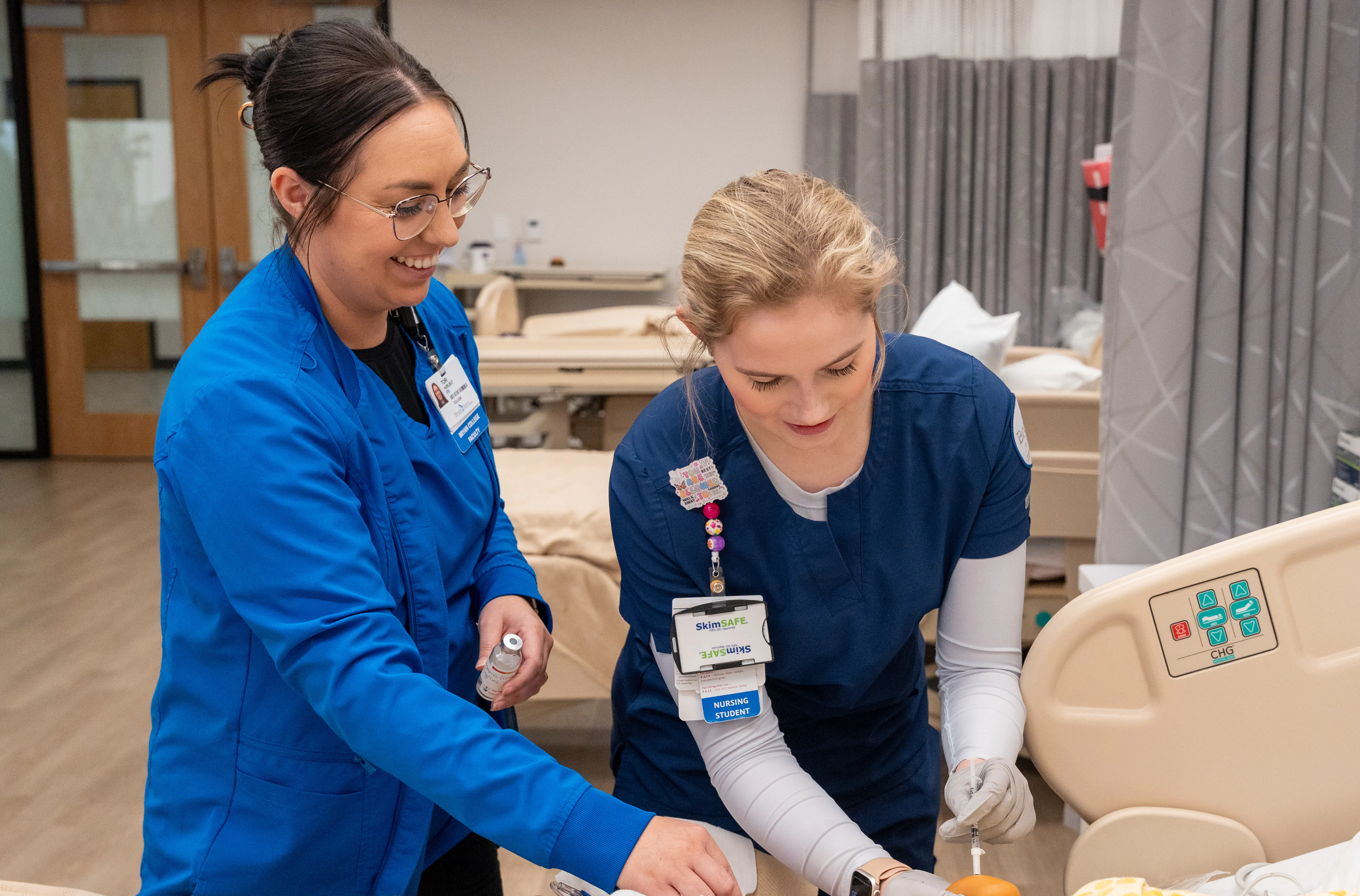 Faculty assisting a student