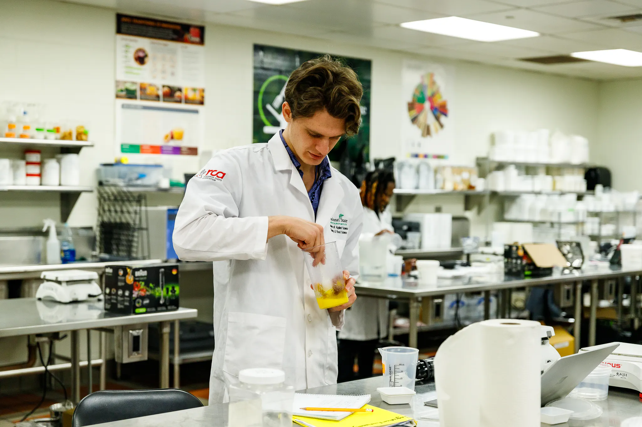 Culinary and food science student in lab