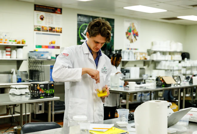Culinary and food science student in lab