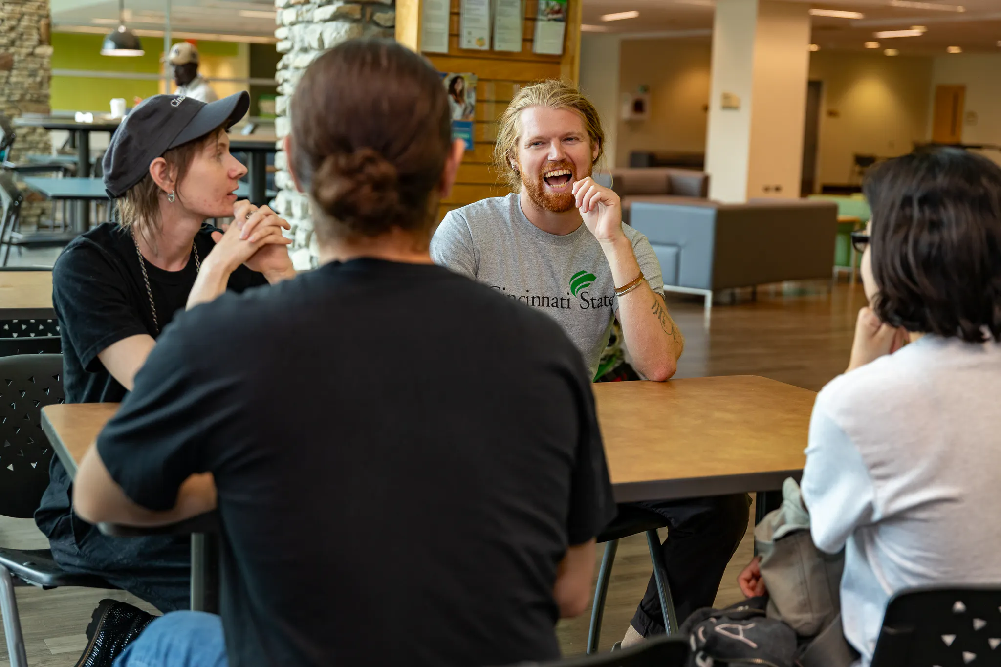 group of students sitting at a table