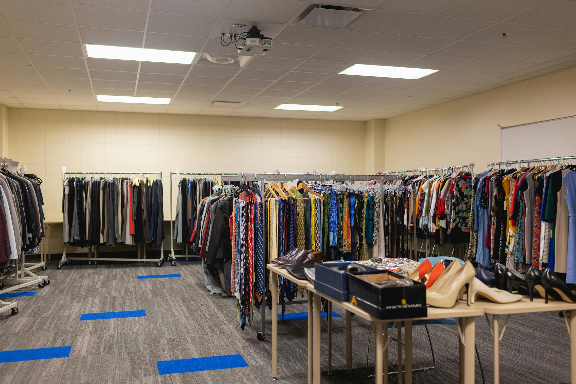 Racks of organized clothes at the Professional Clothing Closet