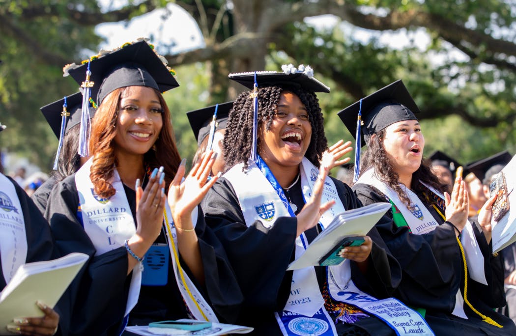 Dillard commencement, graduates clapping and cheering