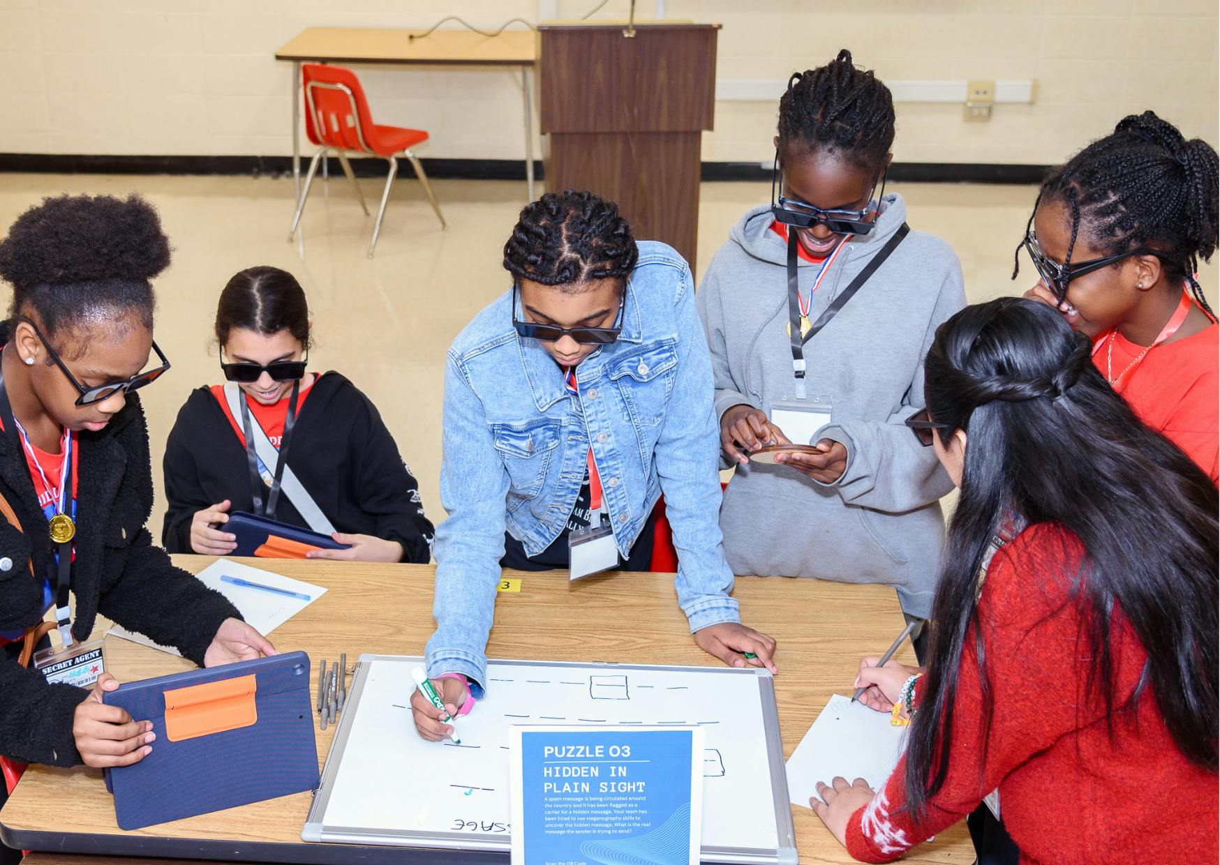 Bush Hills STEAM Academy Student Fellows actively participating in the Effective Communicator challenge while interviewing Birmingham Mayor Woodfin. 