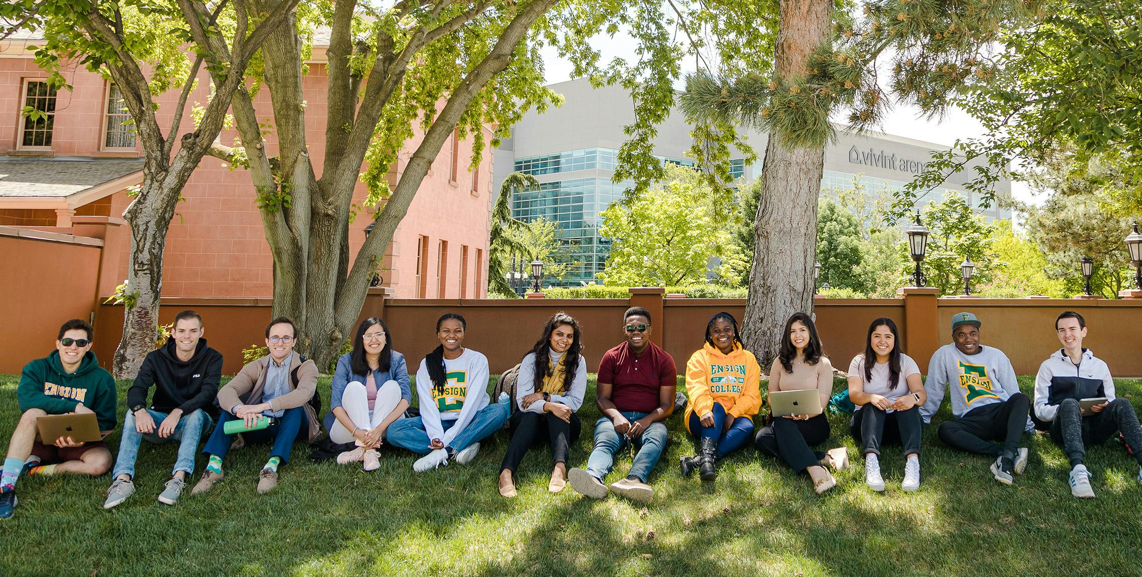 elm-pg-billboard-cta wide student group on lawn