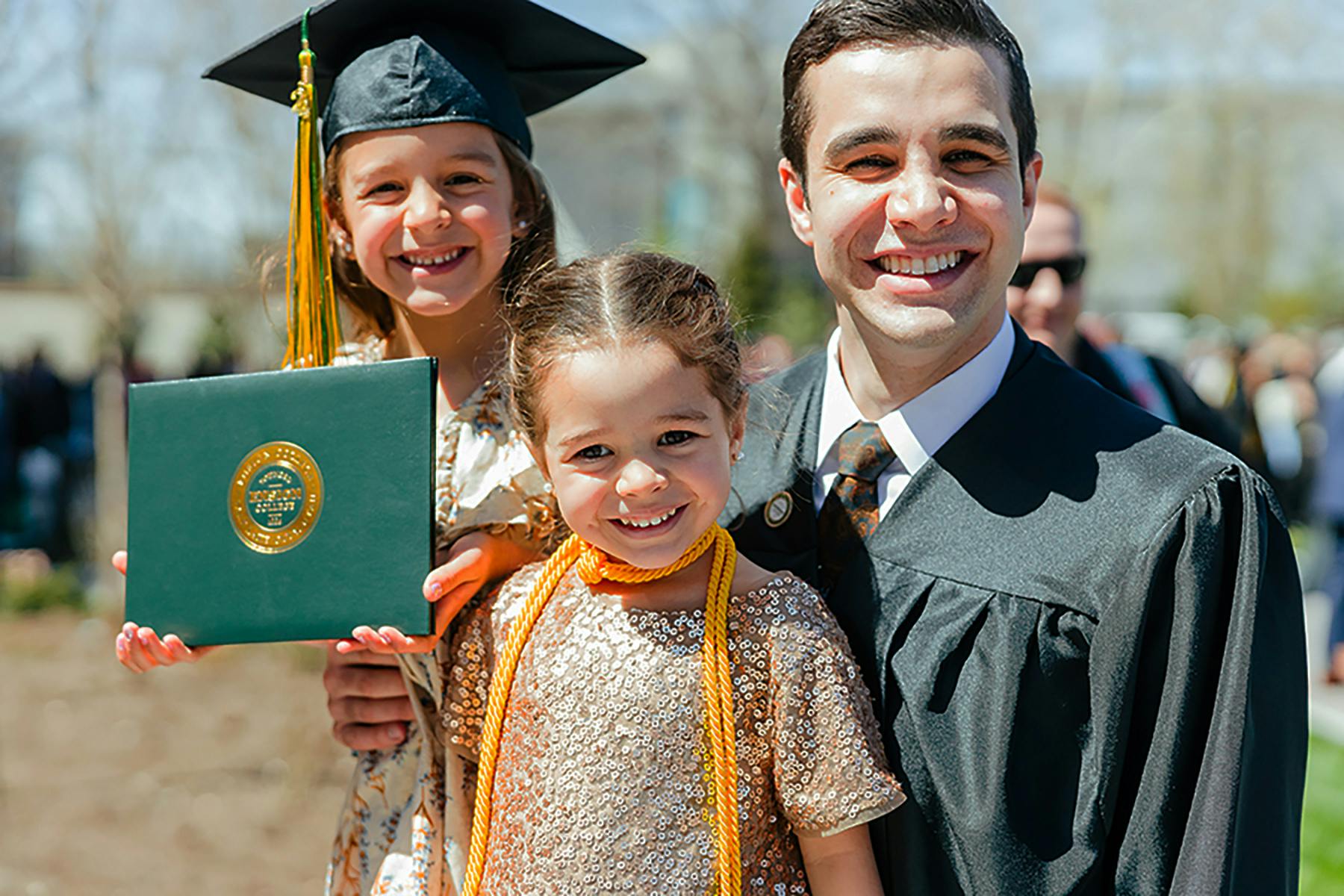 commencement father with daughters