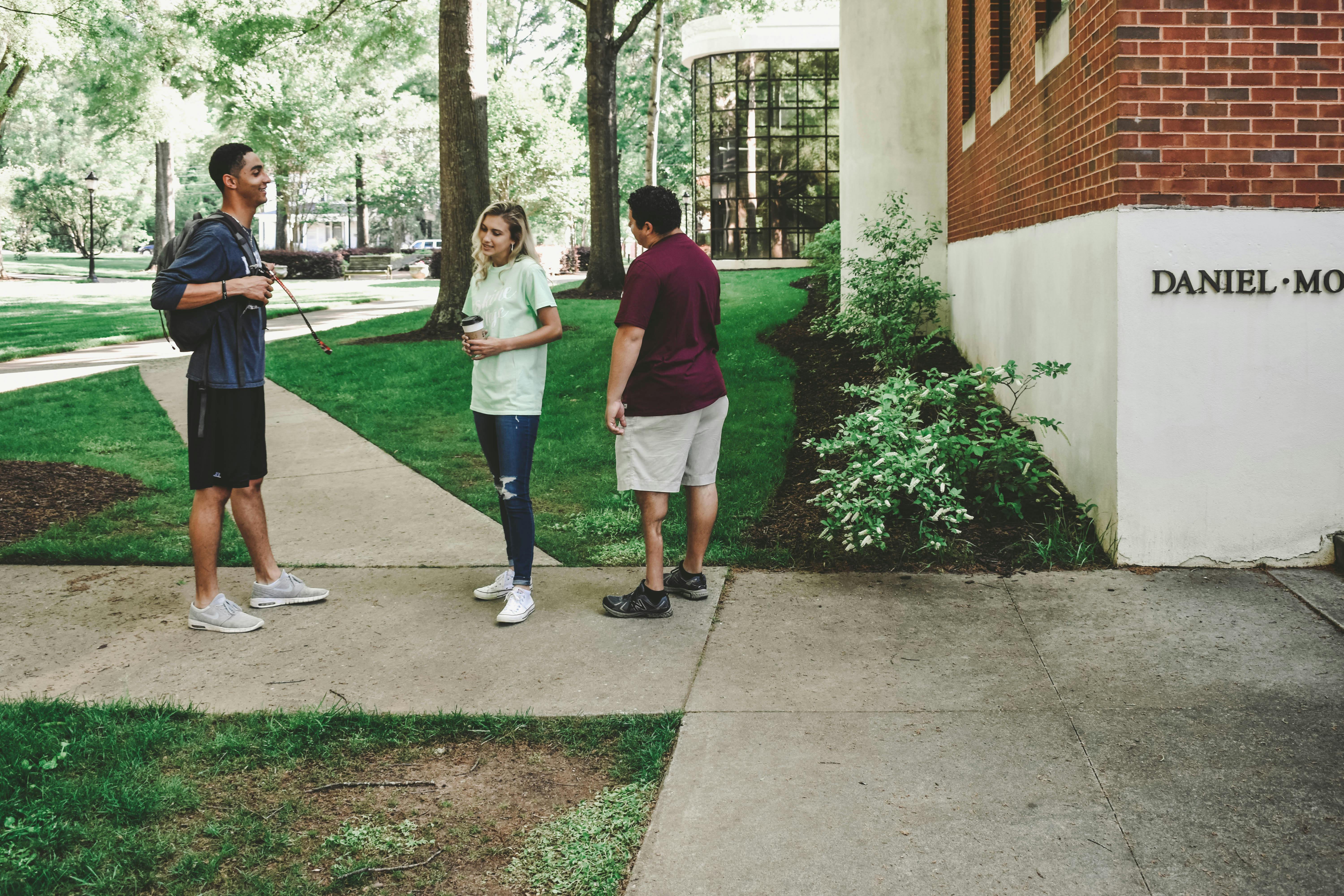 Students talk outside Daniel•Moultrie Science Center