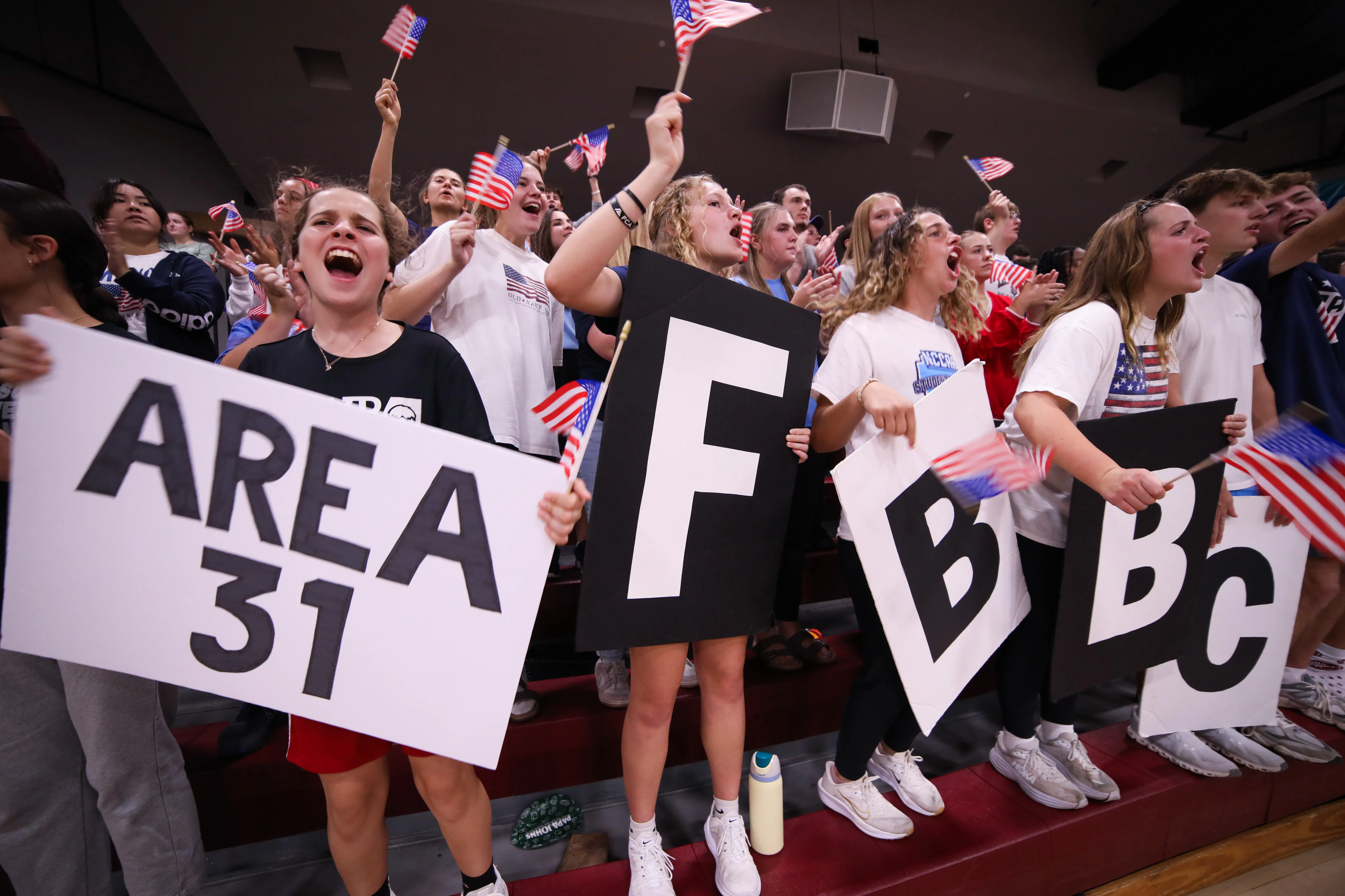 Faith students cheering on their basketball team 