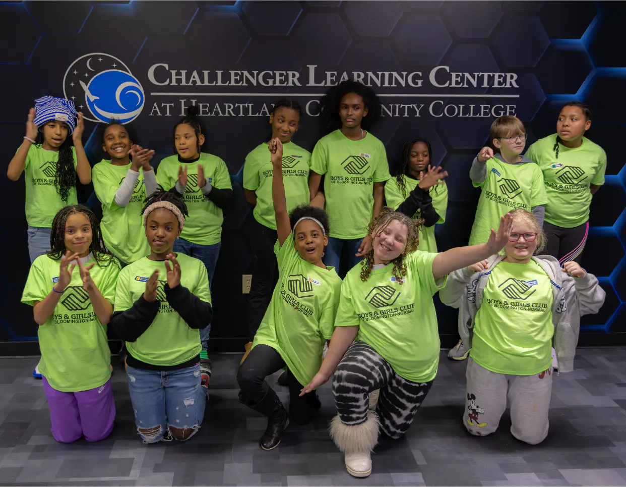 Youth Build class posing at the Challenger Learning Center