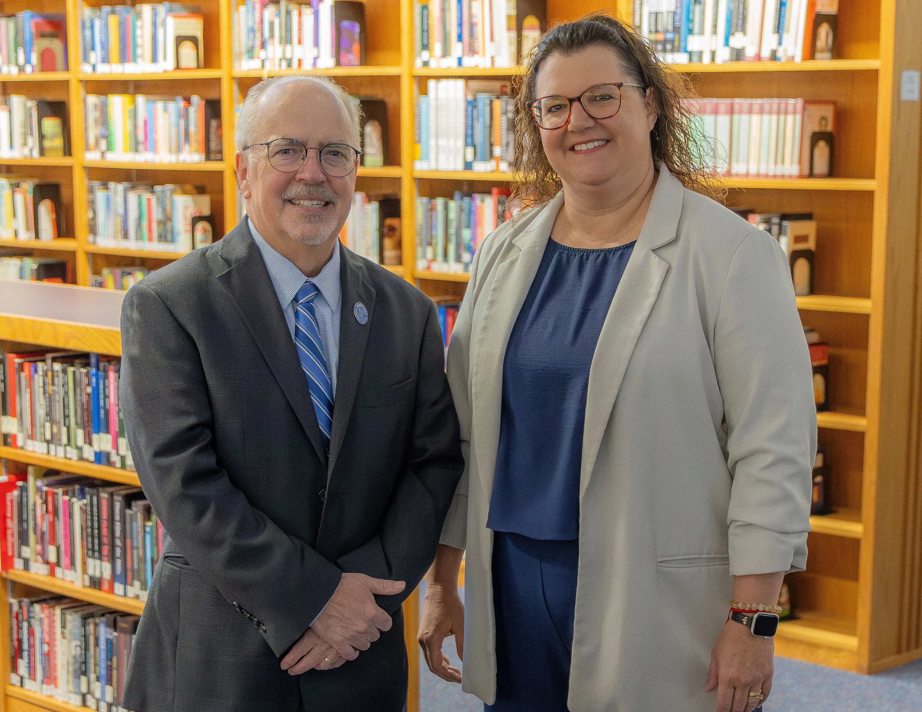 Image of President of Heartland Community College, Keith Cornille and Heartland Board of Trustee Chair, Becky Ropp.