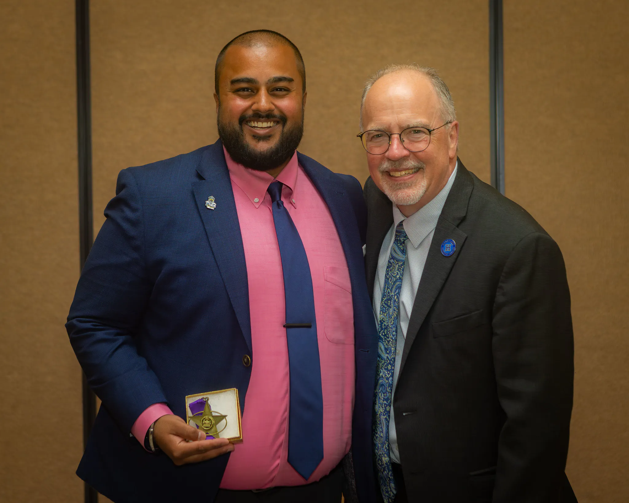 Image of Simran "Sim" Sandu and HCC President, Keith Cornille