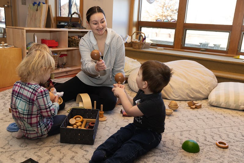 childcare worker with children