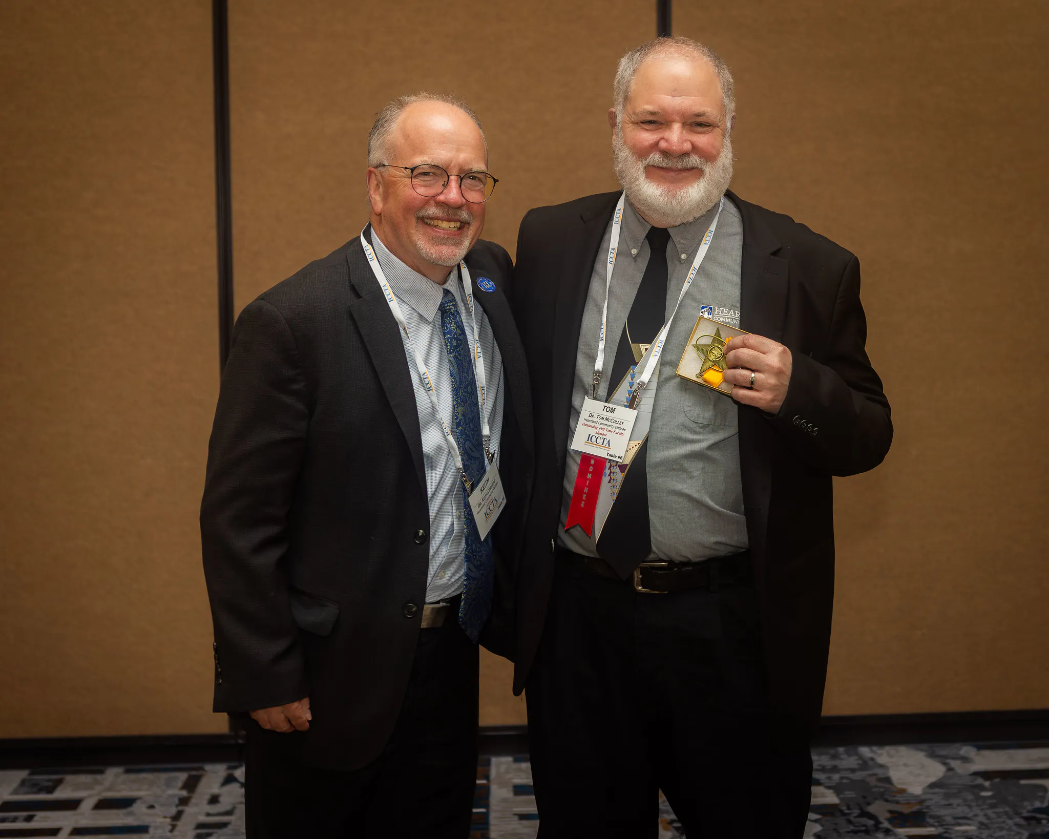 Image of Heartland Community College president, Keith Cornille and Tom McCulley. The recipient of the 2025 Outstanding Full-Time Faculty Award. 