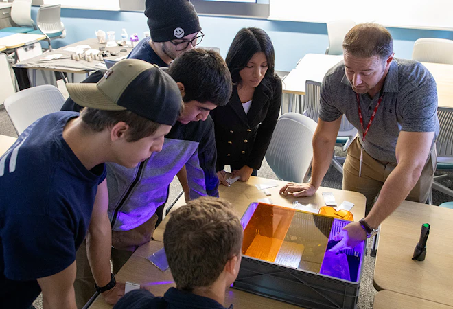 Students in the Criminal Justice program participate in a demonstration of a crime scene investigation.