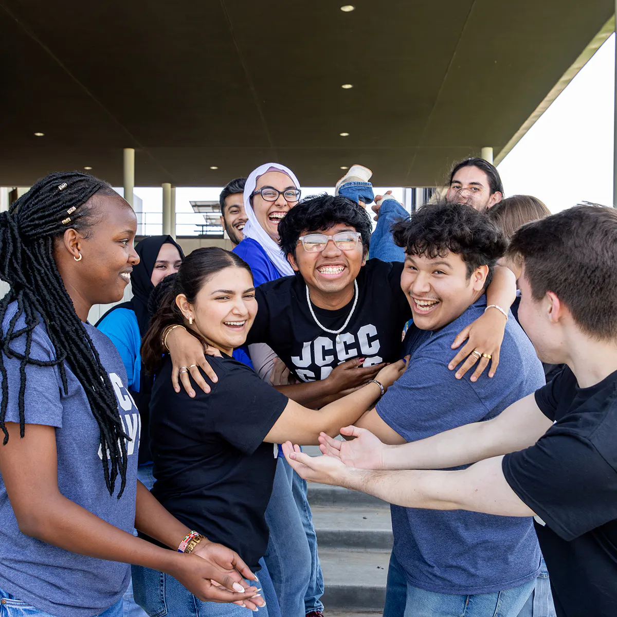 Group of students celebrating on campus