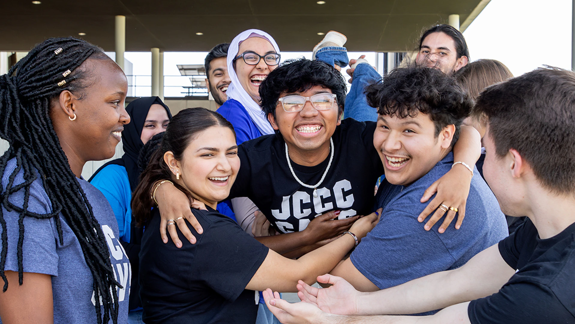Group of students celebrating on campus