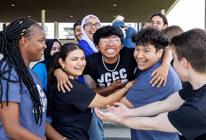 Group of students celebrating on campus