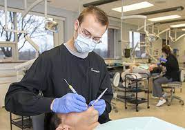 Dental student at work in the clinic
