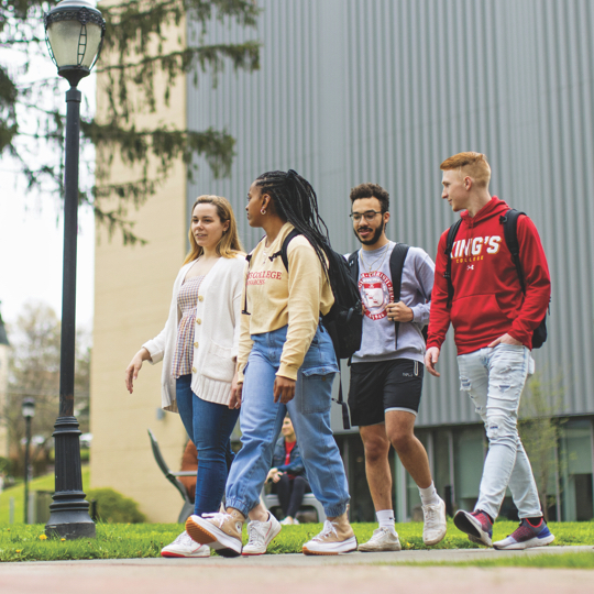 group of students walking on campus