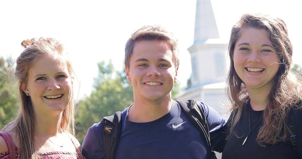 elm-pg-billboard-form 3-students-and-Chapel-cropped-1-1024x541