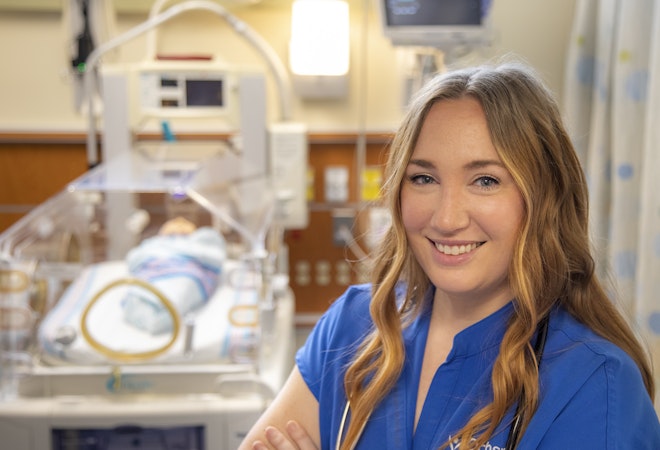 UL Lafayette RN to BSN graduate Kelie Hargroder is pictured in a hospital NICU.