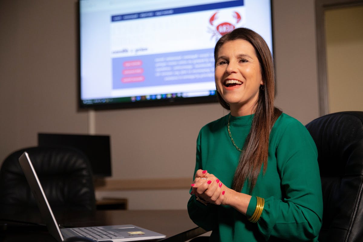 Stock image: Doctors and administrators review information at a conference table