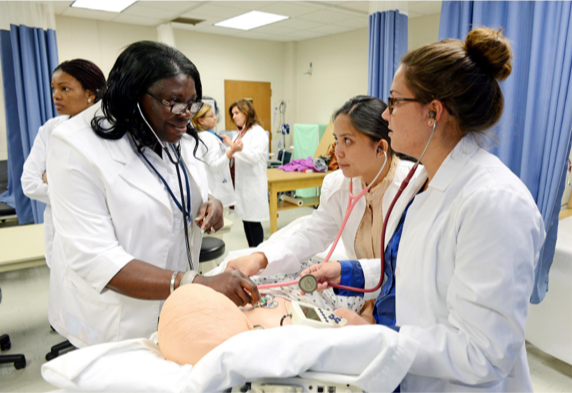 Nursing lab with students and instructor