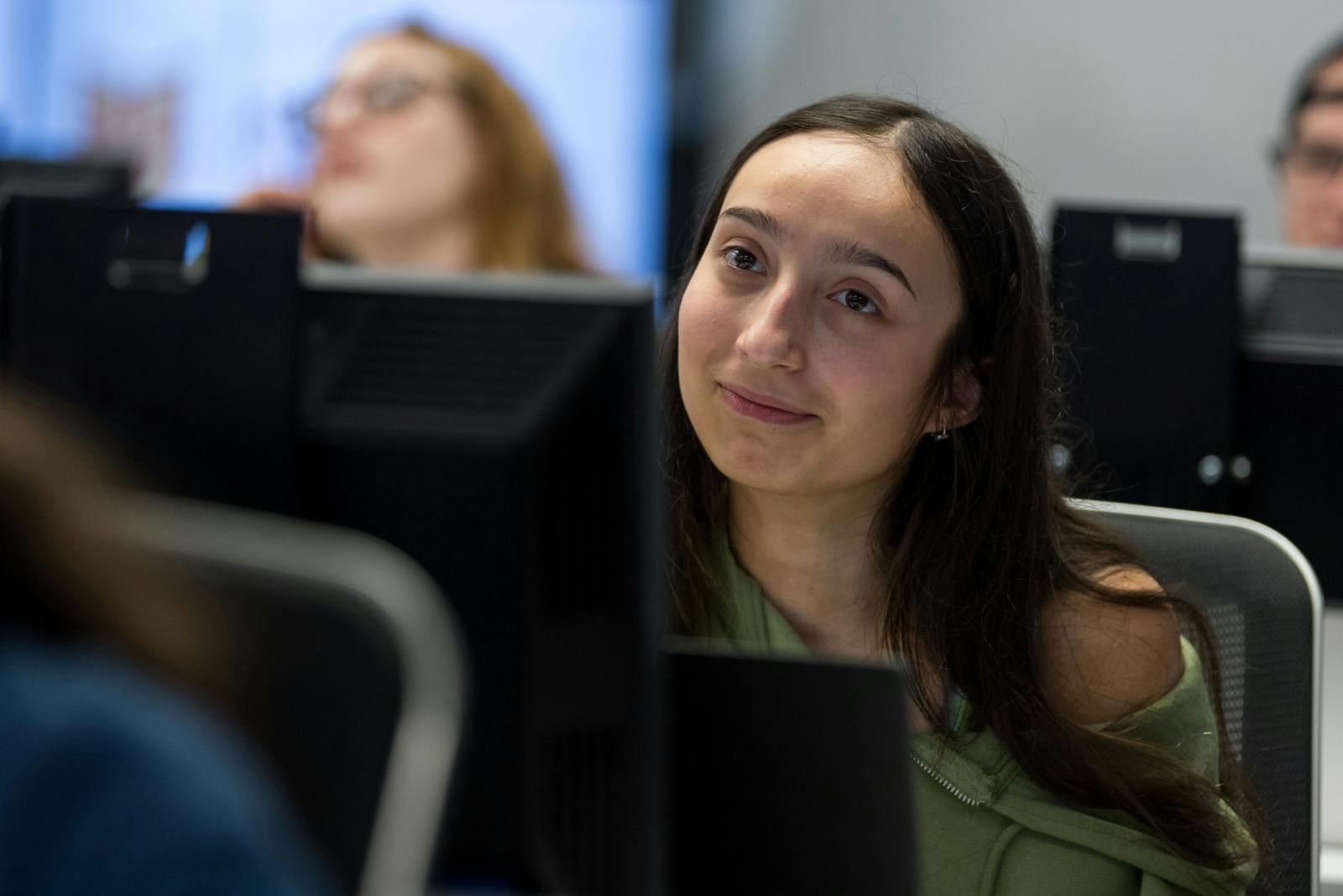 Happy student on laptop