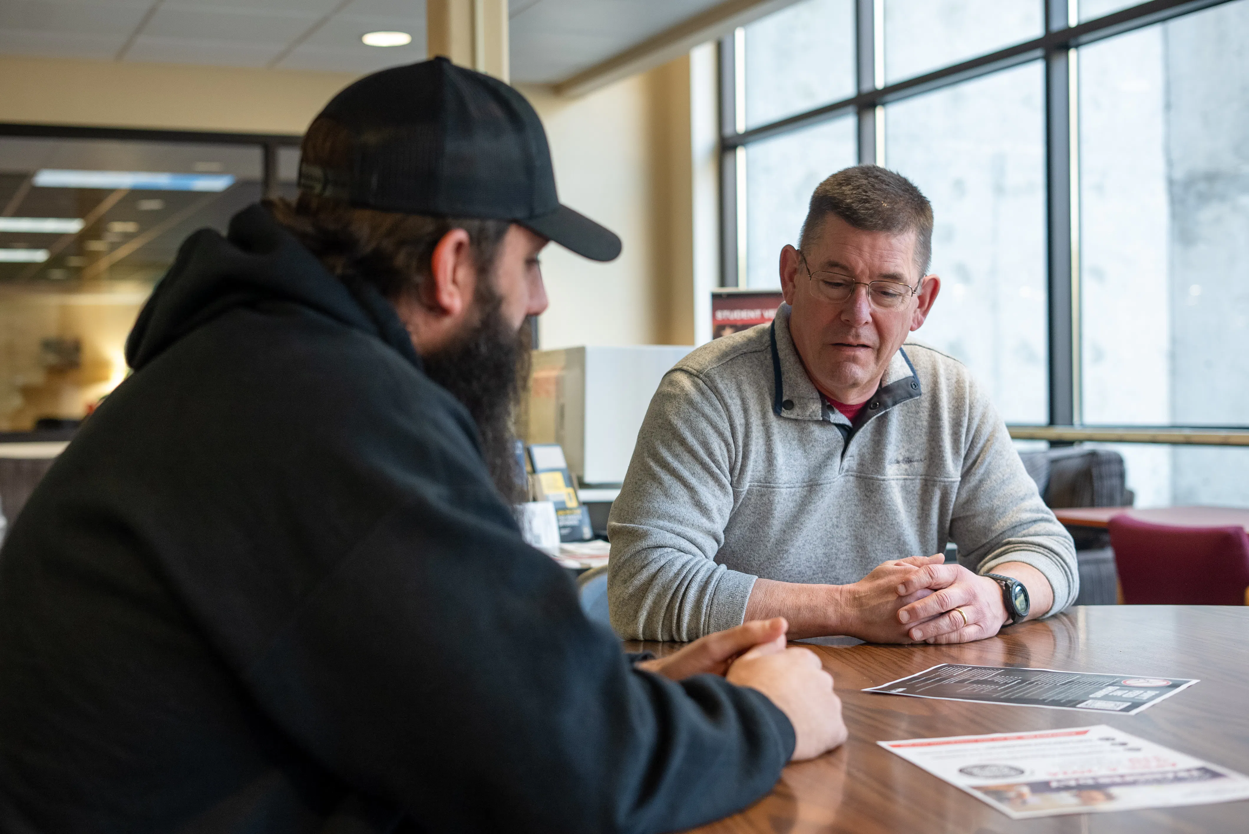 A student and advisor meeting together