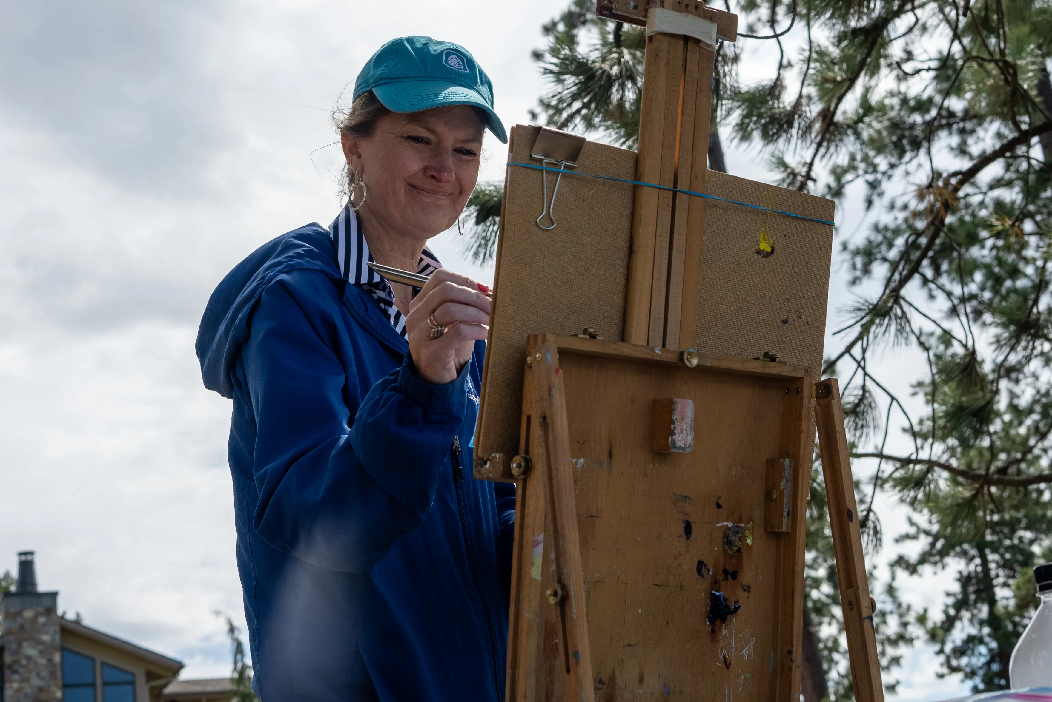 Woman painting outside