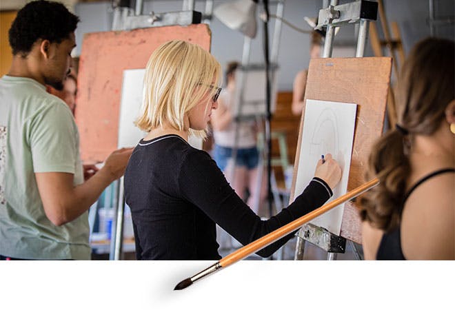 Students work on projects in drawing class.