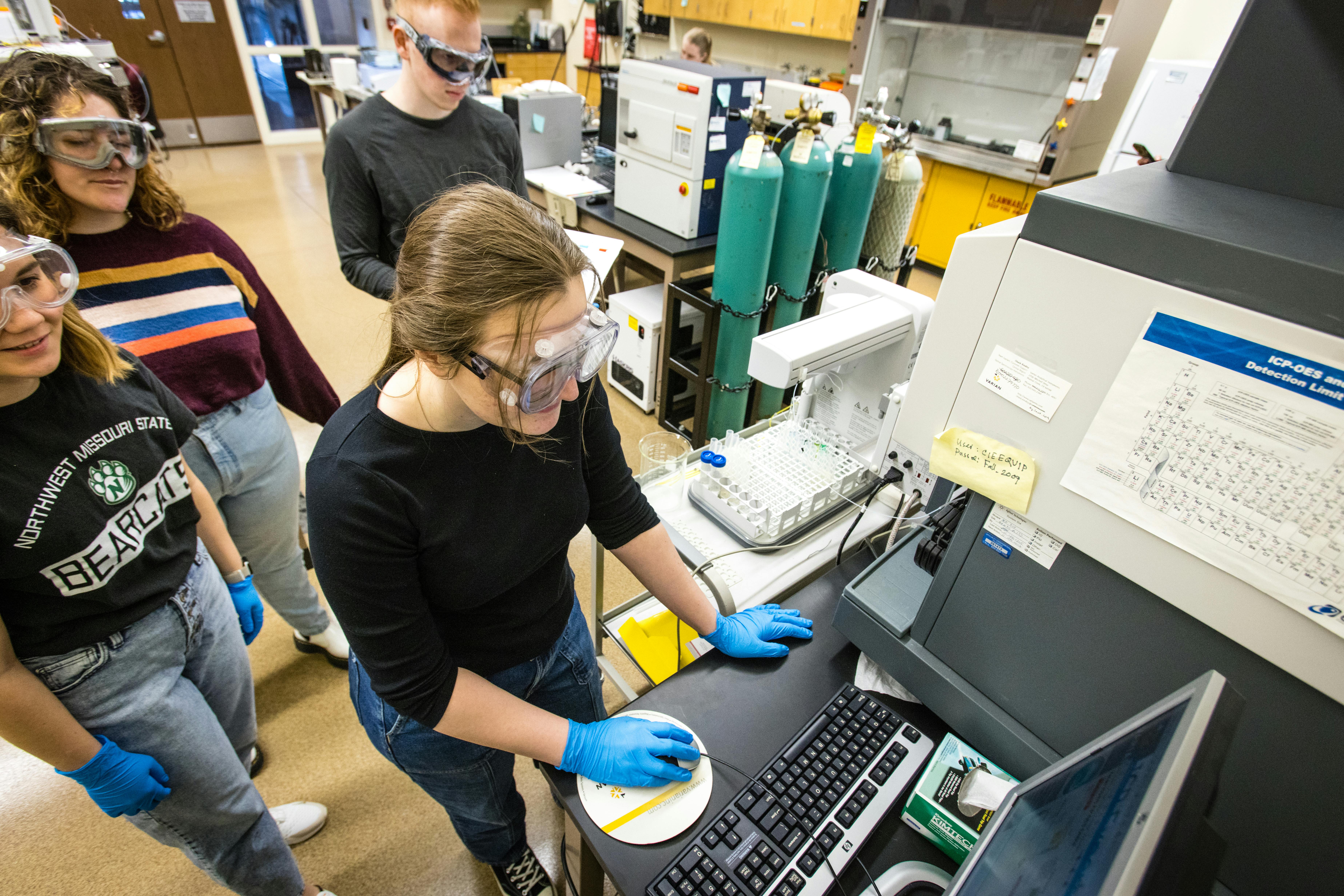A student enters data from a lab.