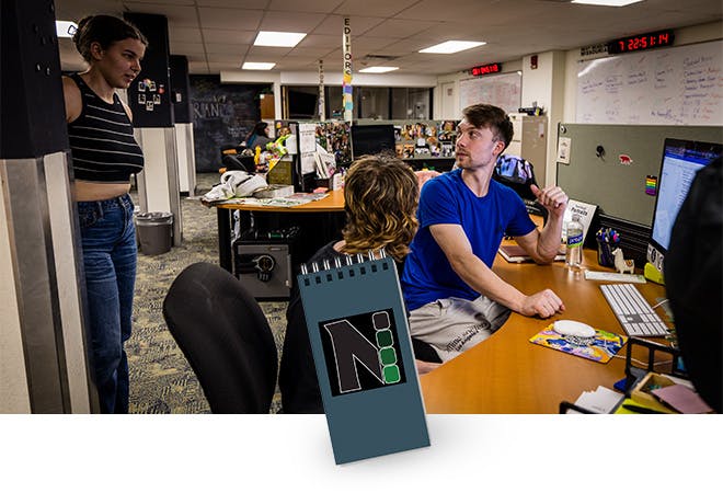 Students work together on a story for the Northwest Missourian.