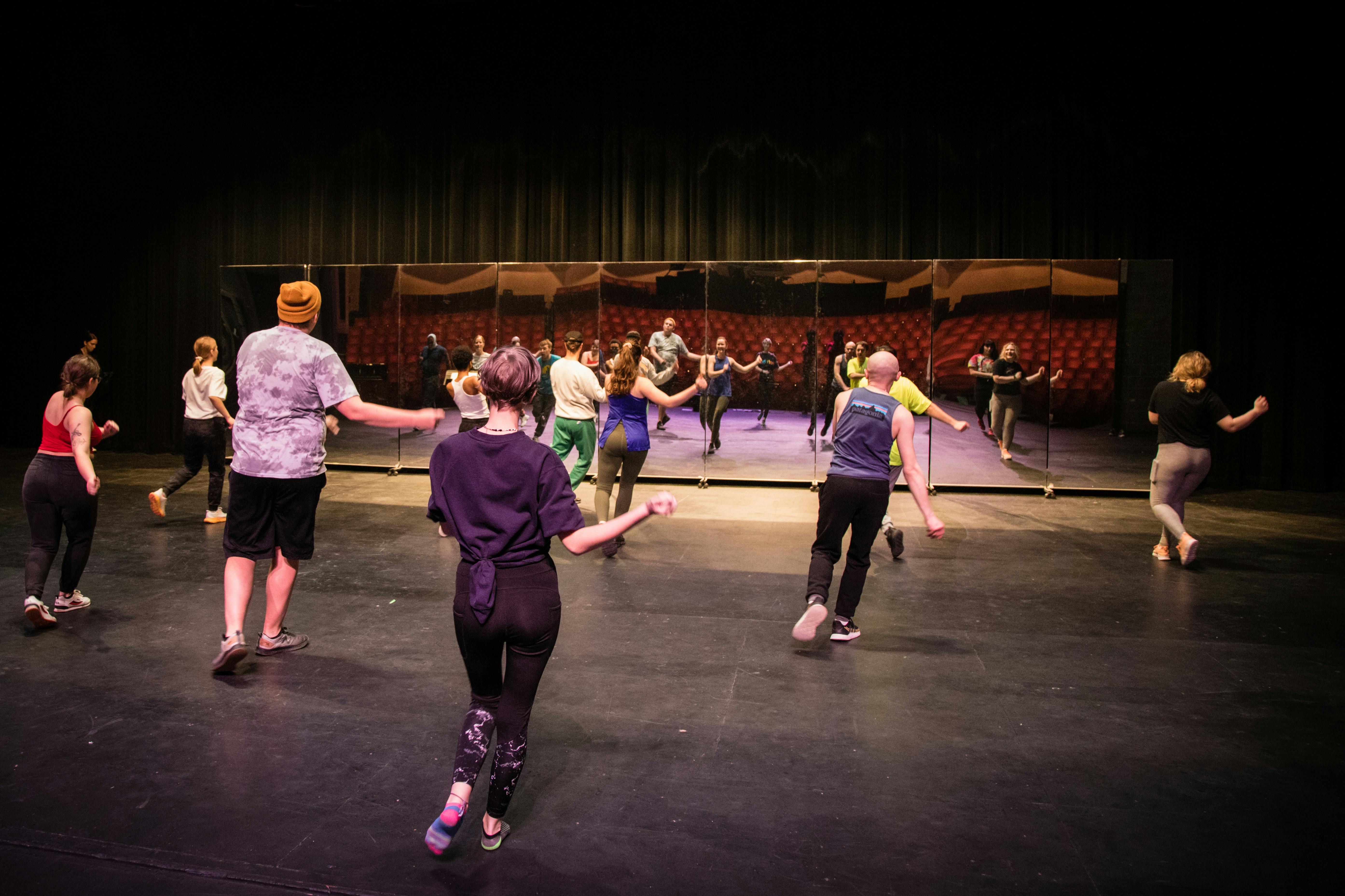 Students learn choreography musical theatre dance workshop.