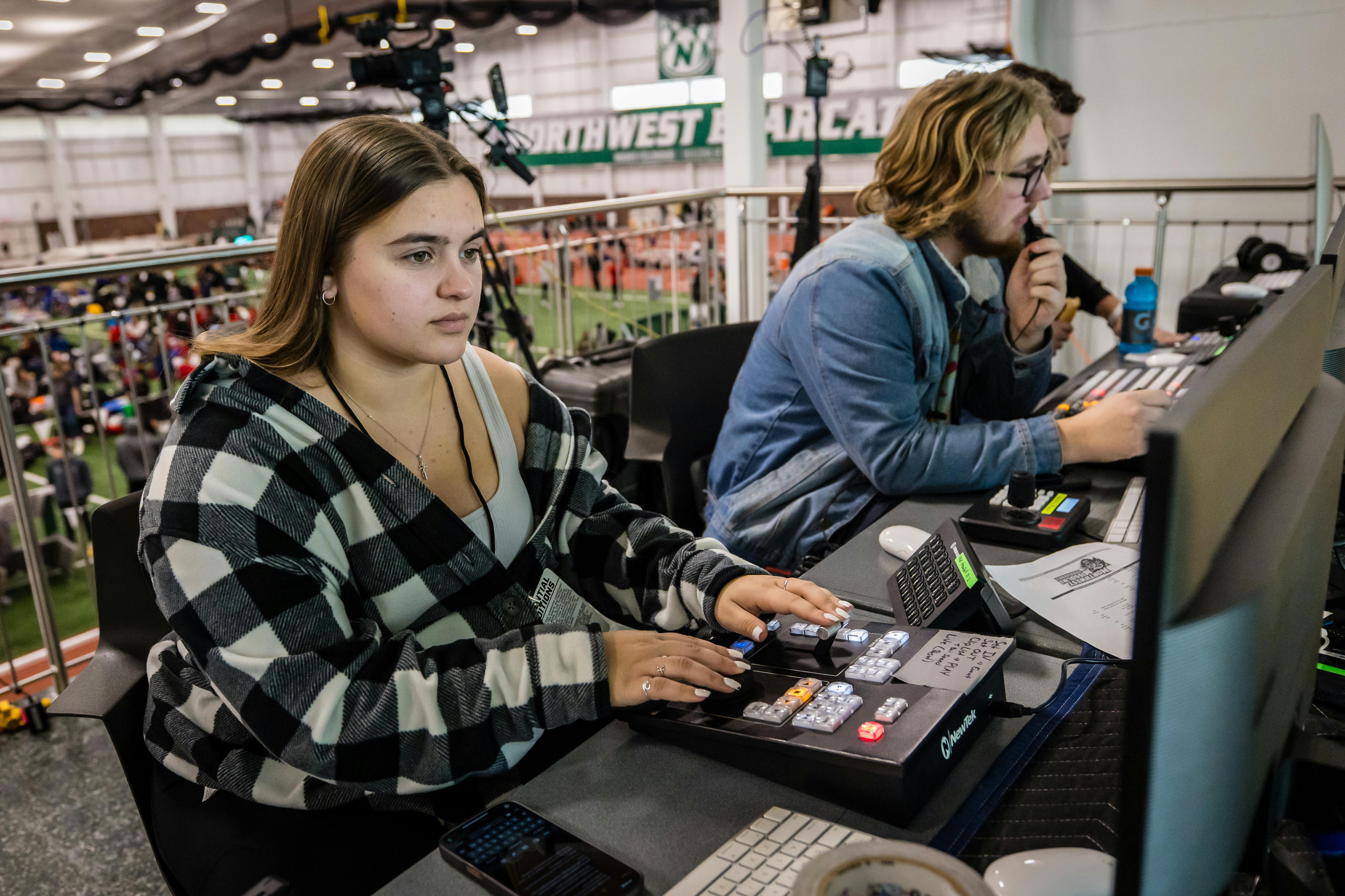 Students work on broadcasting the Mel Tjeerdsma Classic track meet at Northwest.