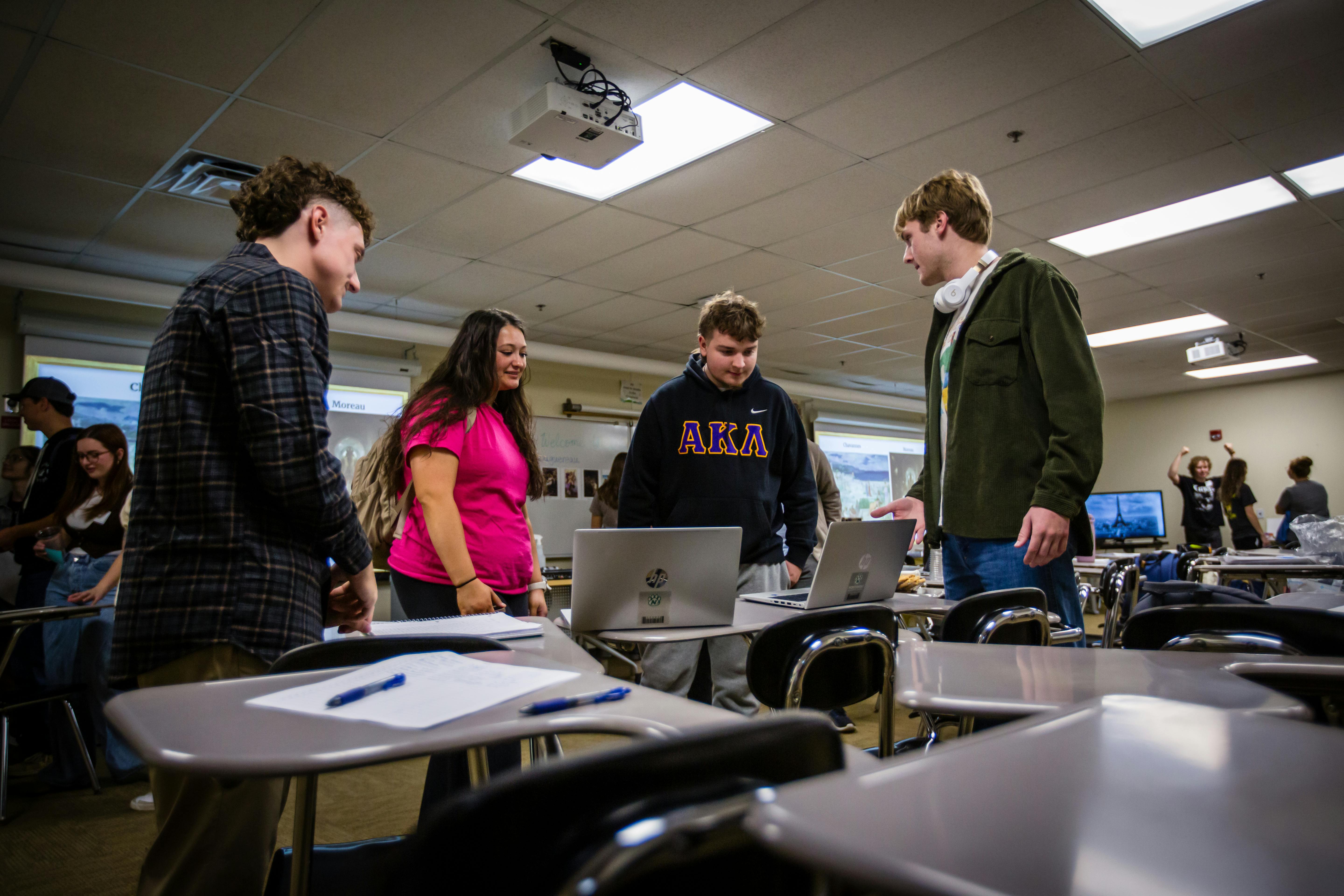 Students work together in classroom assets.