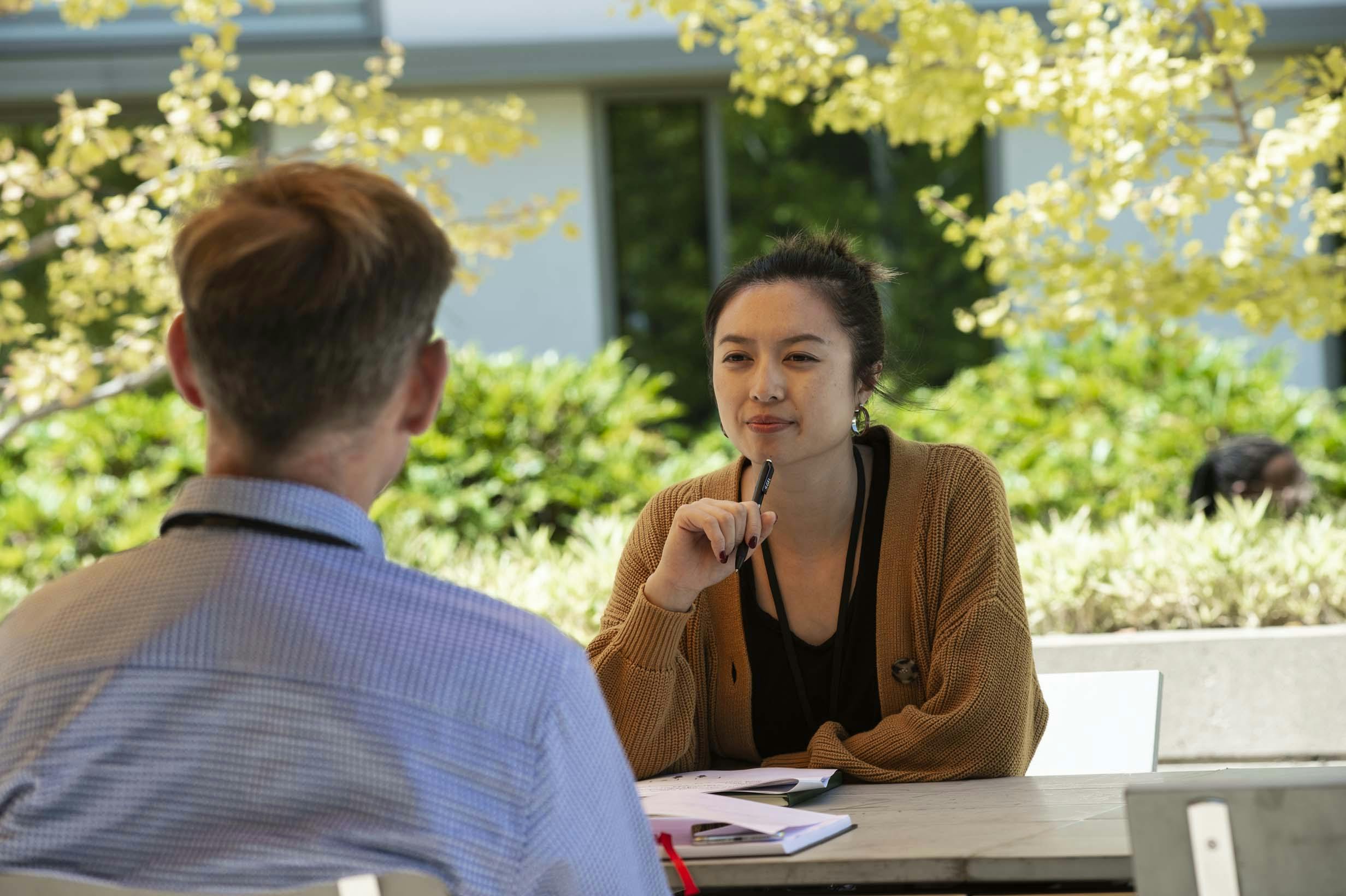 Students talking in one of our courtyards