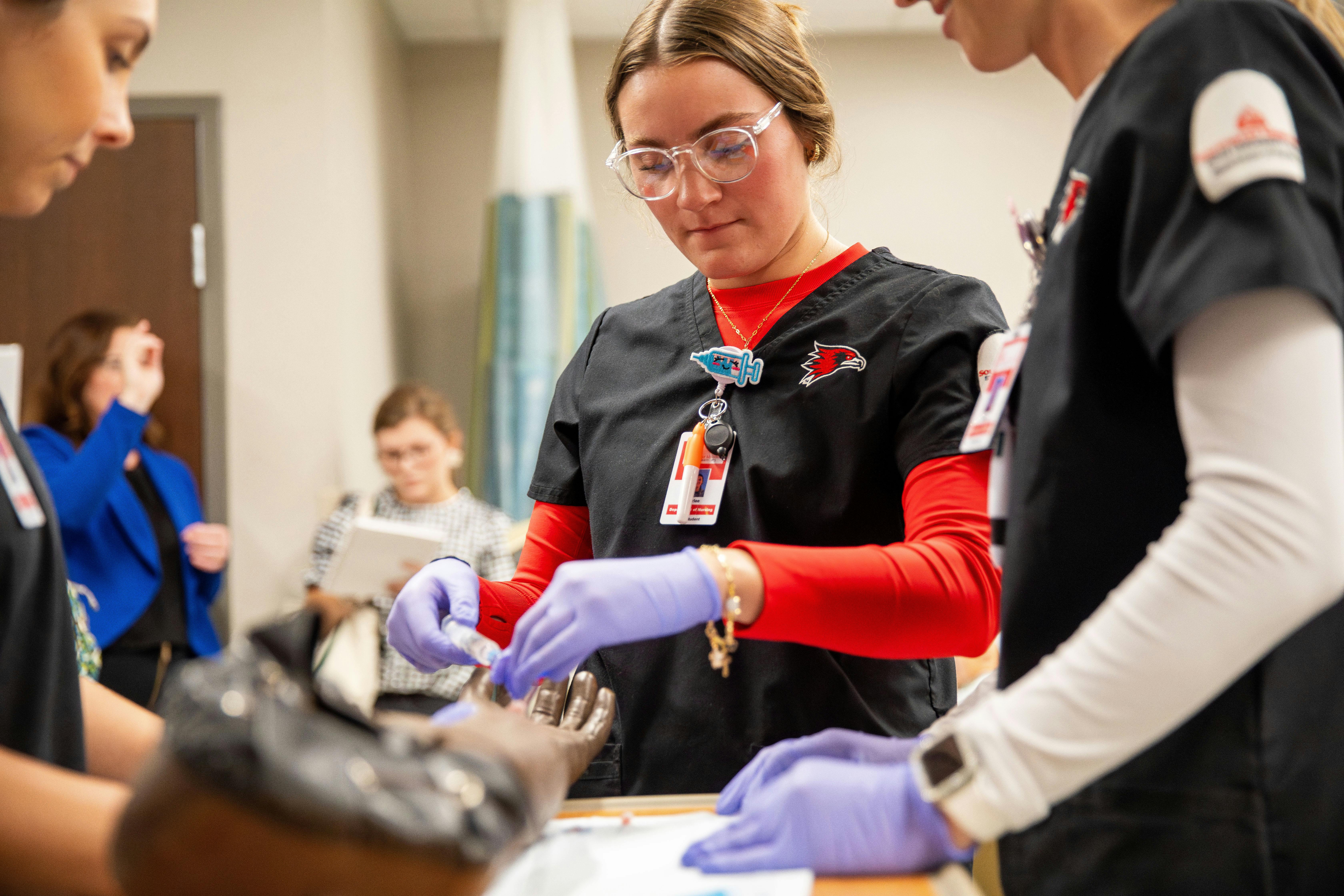 elm-pg-billboard-cta 2025-CEHHS-Nursing-Lab-CD-0908-046 (1)