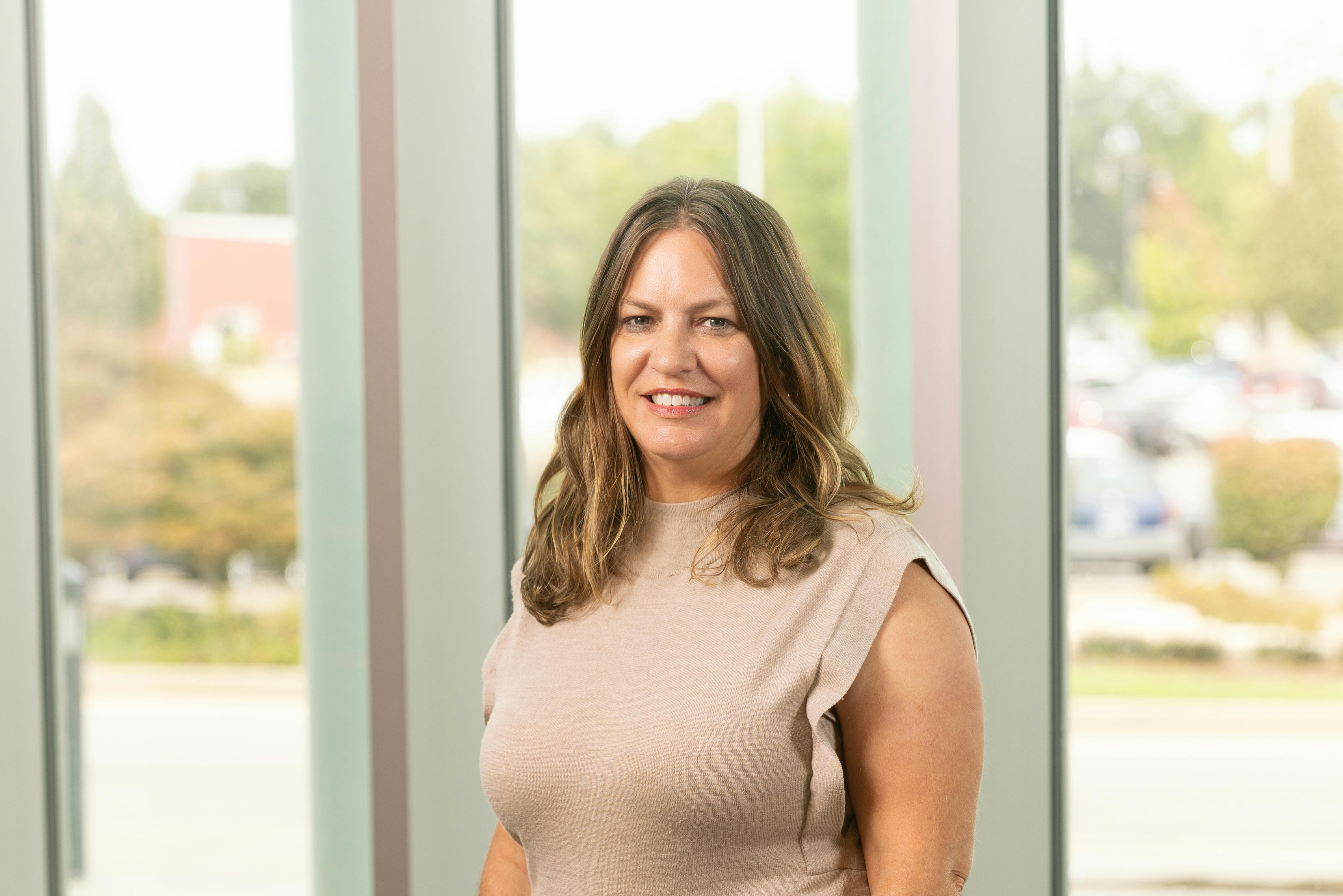 professional headshot of Dr. Sara Garner, Associate professor for Child and Family studies