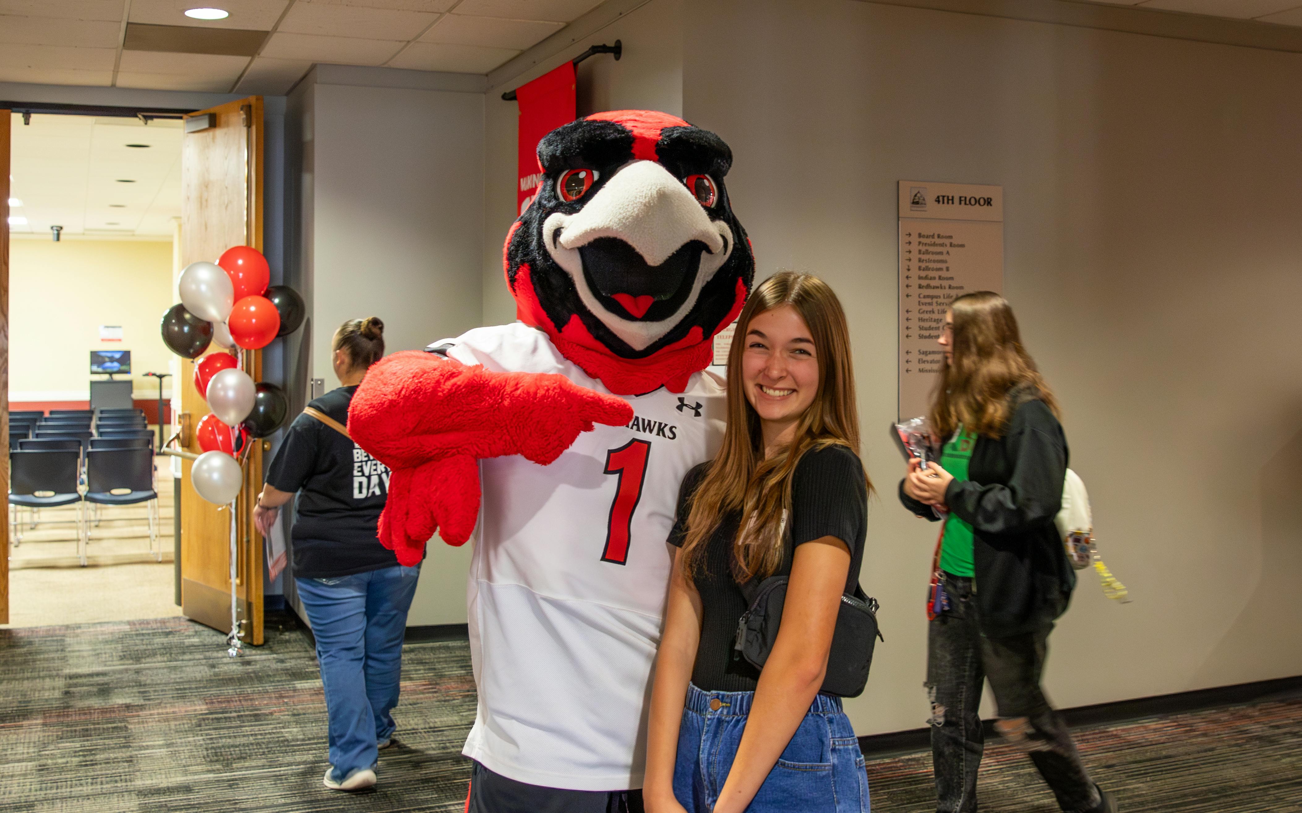 Rowdy with a student on a Tour Day 