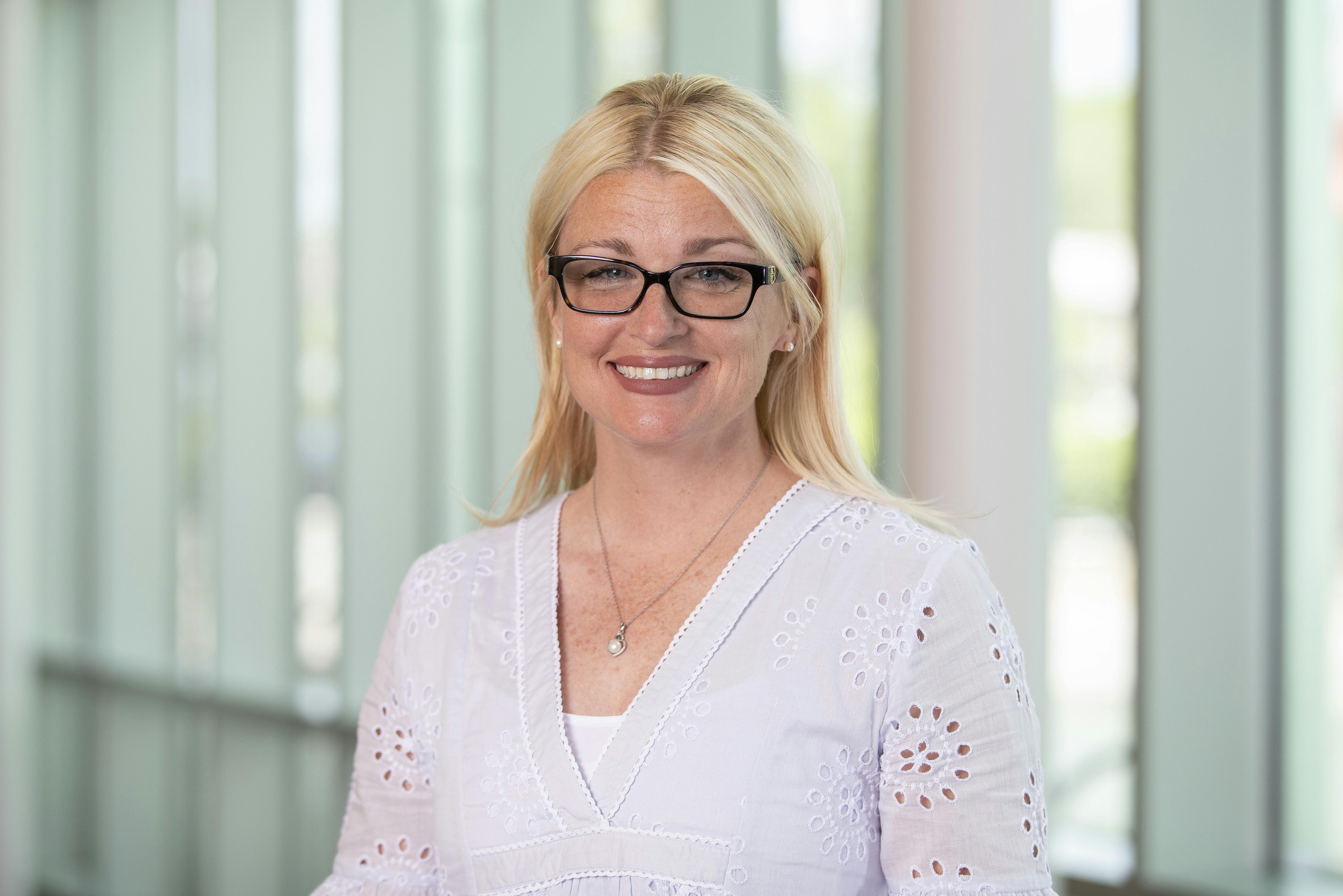 professional headshot for Brandy Helper, assistant professor in the department of elementary, early, and special education