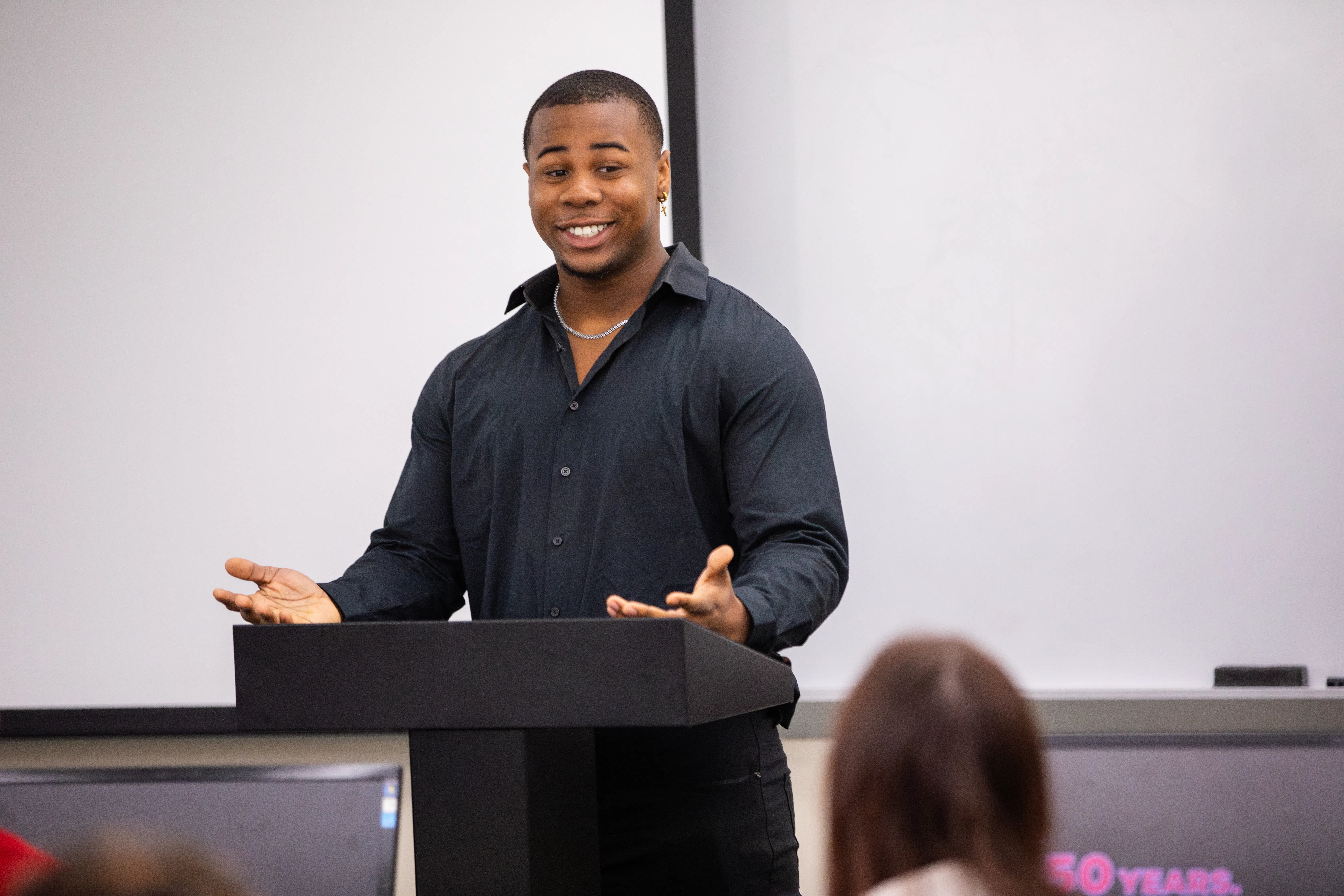 Political science student giving a presentation to the class.