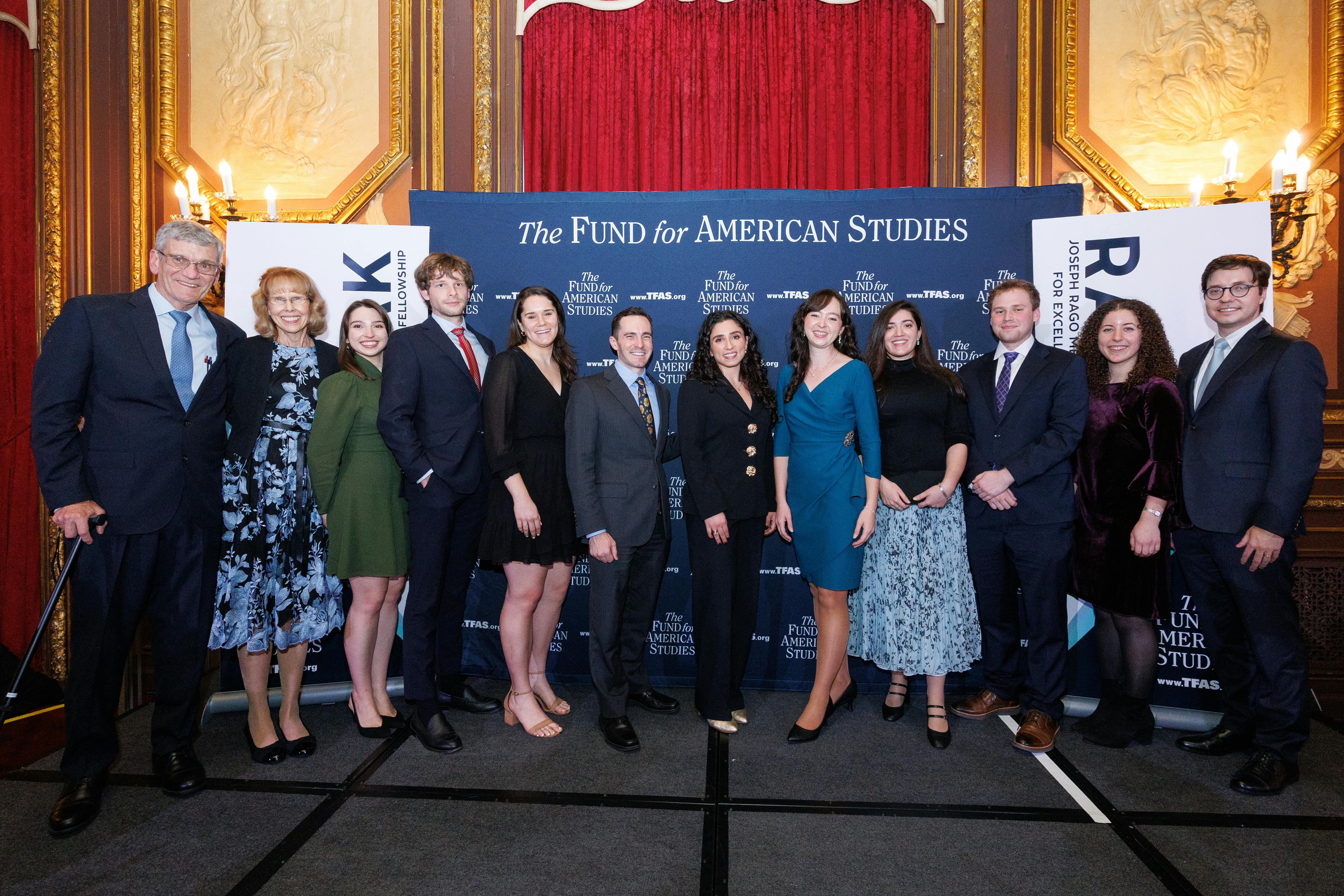 Seven Rago Fellowship Alumni and Three Rago Fellows Posing For Photo with Paul and Nancy Rago