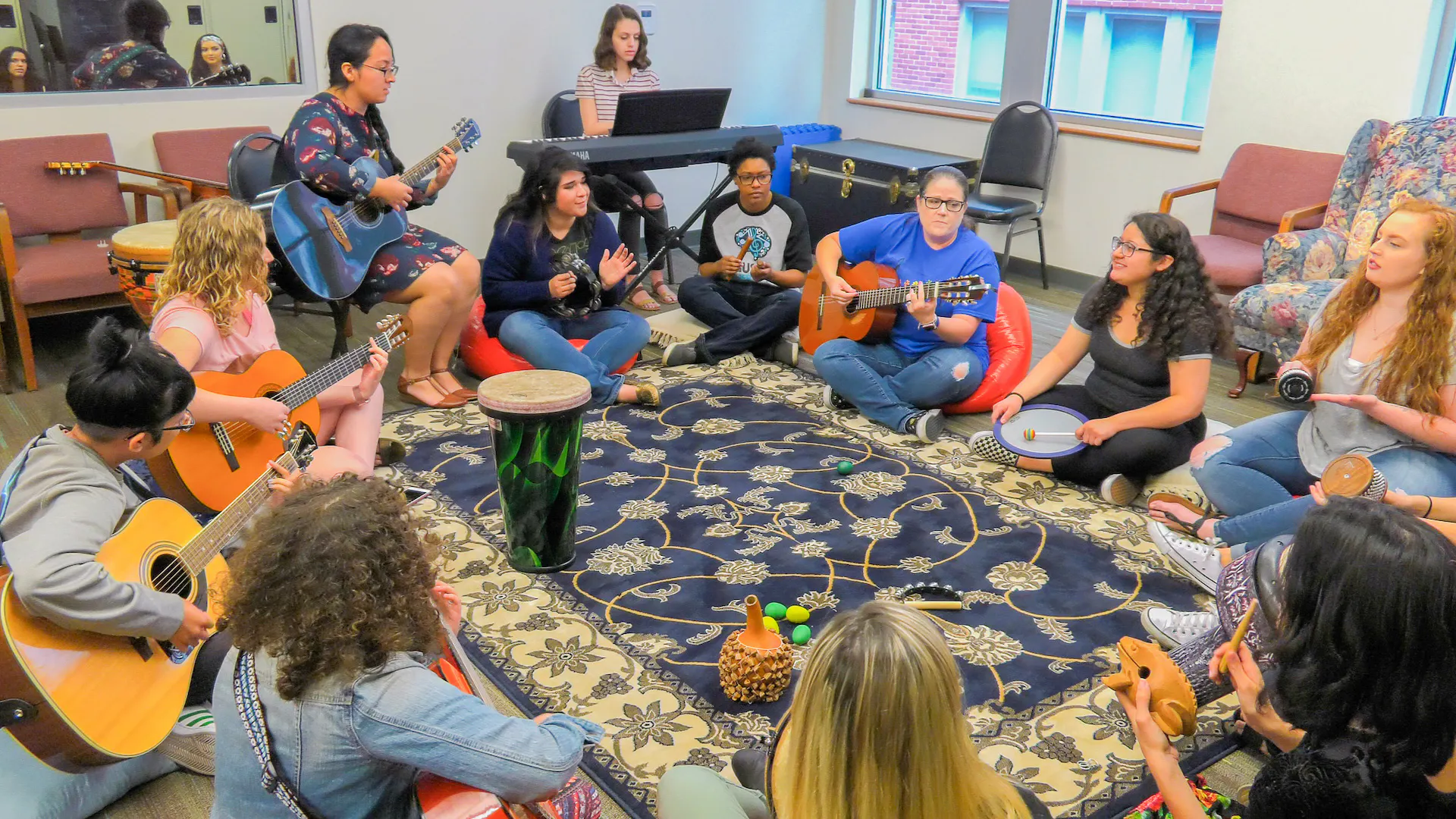 Students playing instruments in Music Therapy class